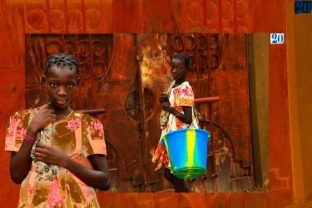 BORN INVISIBLE Burkina Faso girl with pail